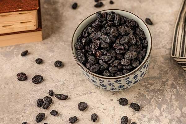 تصویر 4 از قیمت کشمش سیاه افغانستان با کیفیت ارزان + خرید عمده